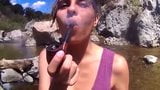 Beautiful girl smoking her pipe snapshot 8