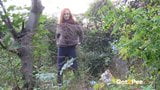 Redheaded Babe Pisses Long And Hard In Trees snapshot 9
