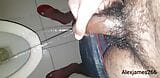 Horny guy pissing in the toilet snapshot 7