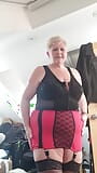 Red and black girdle, and a cheeky view of that ass snapshot 7