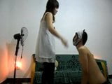 asian mistress slaps a slave really hard snapshot 5