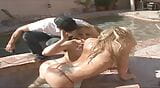 Alexis Texas and Megan Monroe are outdoors, having fun in their hot tub, when they take off each other's bras snapshot 6