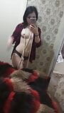 Homemade beautiful naked striptease in front of the mirror. Close-up snapshot 4