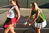 Two teens start lesbian masturbation on tennis court snapshot 9