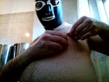 Kocalos - I wear a latex mask and pierce a nipple snapshot 6