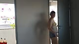 My wife answer delivery guys wearing micro biquini. She shows her nipples at the balcony for their. snapshot 3