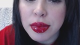 Brunette with red glossy lips snapshot 13