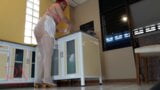 Nudist housekeeper Regina Noir cooking in the kitchen. Naked maid makes dumplings. snapshot 2