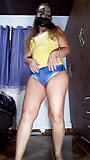 Undressing, denim shorts and yellow thong panties snapshot 1