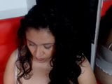 Serious latina playing snapshot 21