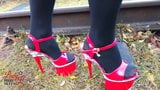 Lady L sexy walking with extreme red high heels. snapshot 4