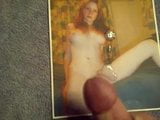 cumming on a pic of a cute redhead snapshot 9