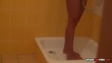 Tattooed chick gets recorded during her shower snapshot 13