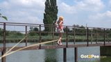 Pretty Blonde Babe Pisses Off Bridge Into River snapshot 9