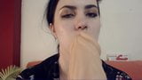 StacyMoon is sucking and licking a giant dildo snapshot 7