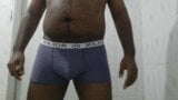An Asian black boy pissing in his underwear snapshot 1