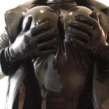 Squeezing sexy latex boobs snapshot 2