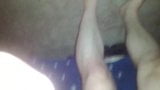 Anak laki-laki meniduri pantat dengan mainan saat memakai cawat olahraga snapshot 1