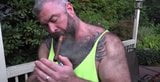 Beautiful daddy bear and his loving pup snapshot 2