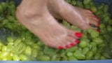 Feet with Long Red Toenails Stomping Green Grapes (II part) snapshot 1