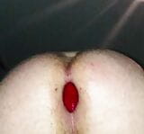 Huge red butt plug fully inside my gaping hole snapshot 7