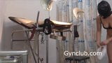 girl in a black mask. exam in gyno chair snapshot 2