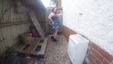 curvy Wife in Denim miniskirt flashing in the yard snapshot 3