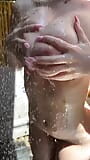 Petite Blonde Squeeze Her Big Tits in Shower snapshot 4