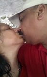 Mature couple kissing outdoor snapshot 1
