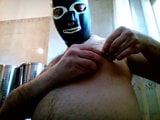 Kocalos - I wear a latex mask and pierce a nipple snapshot 7