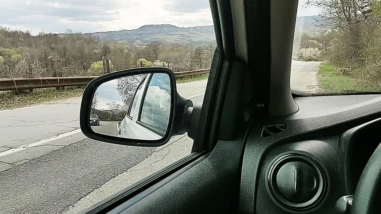 Blowing my load by the side of the road, in my car