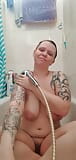 Sexy bitch with big tits enjoying her morning shower snapshot 12