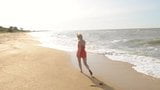 Chanel Fenn alone at a beach snapshot 3