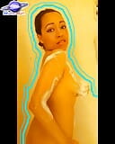 Saturno Squirt, the sexiest Latin babe that exists, takes a soapy bath while playing with her delicious tits, she is hot, come snapshot 4