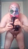 Fag Jester Stuffing its Cock-Whore Mouth with Dildos snapshot 3