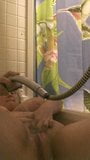 Big Titted BBW uses showerhead on her clit snapshot 4