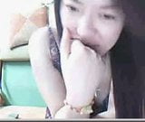 Aziatisch Chinees meisje toont tieten op webcam snapshot 8