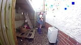 Wife in wellingtons and dungarees in the yard snapshot 2