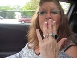 Pretty Grandma smokes in the car snapshot 10