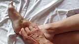 Selena's relaxing in bed and footjob snapshot 12