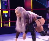 WWE - Liv Morgan posing between the ring ropes snapshot 1