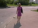 Beautiful blonde walking barefoot in town. snapshot 9