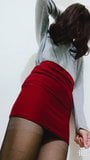 Crossdresser Teasing in Red Pencil Skirt and Pantyhose snapshot 1