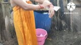 Indian house wife bathing outside snapshot 1