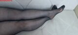 From another point of view, Anna's black pantyhose, legs and feet. snapshot 5