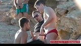 Threesome in the gay nudist beach snapshot 2