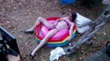 Outdoor WAM sissy gurl in pink pvc micro bikini oiled up and drenched in milky water plays with herself no cum snapshot 4