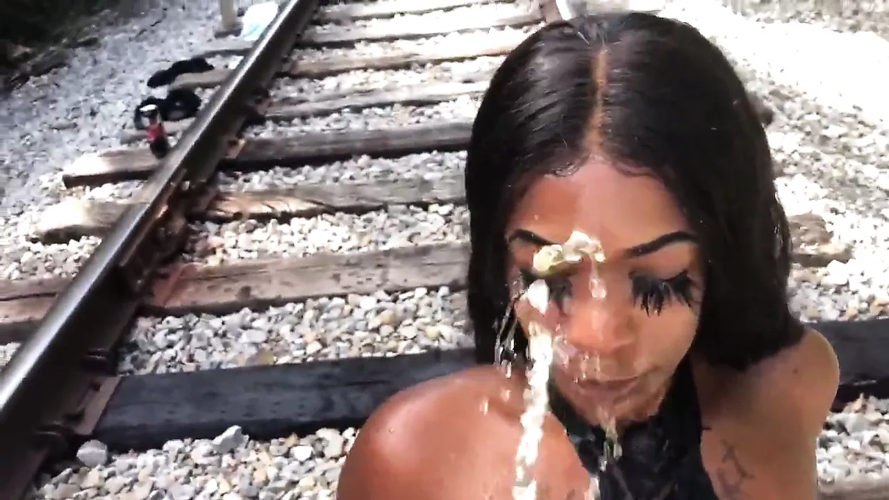 Free watch & Download Ebony slut has an outdoor golden shower