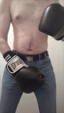 Boxer in Levis gets fleshed and cums on his glove snapshot 2