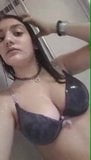 Hot bitch in the shower showing off massive tits snapshot 2